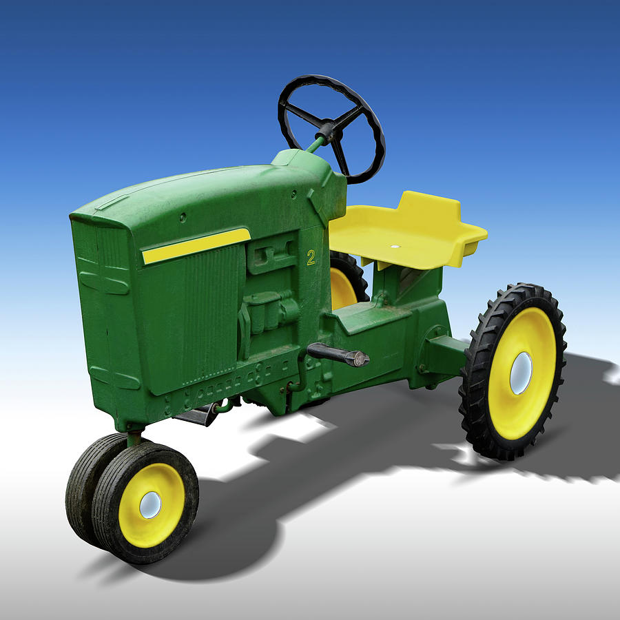 Green Peddle Tractor Photograph by Mike McGlothlen