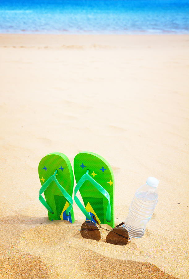 Green Sandals on Beach Photograph by Anastasy Yarmolovich