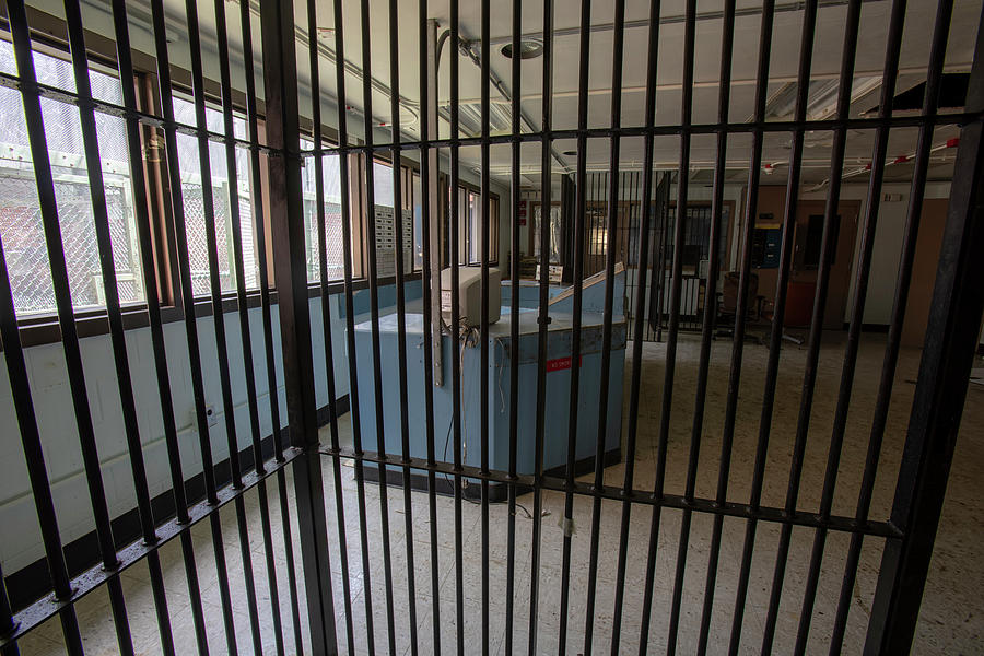 Guard desk inside prison cellblock Photograph by Karen Foley
