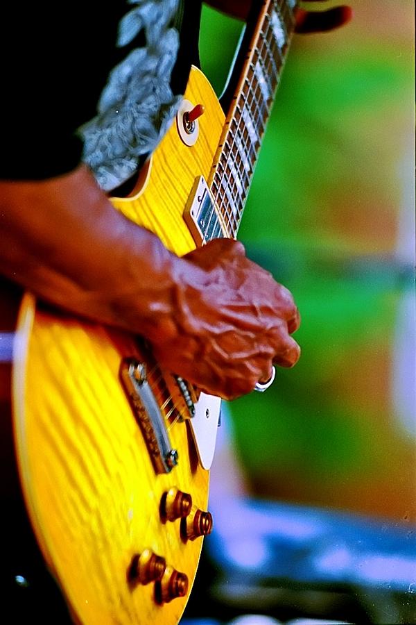 Guitar hand Photograph by Bill Jonscher