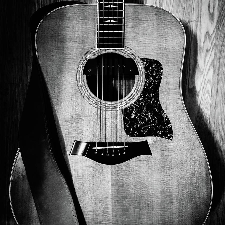 black acoustic guitar photography