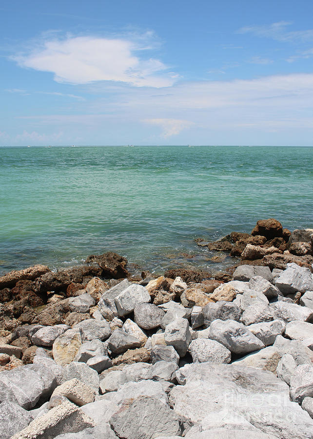Gulf of Mexico with Rocks and Blue Sky Photograph by Carol Groenen