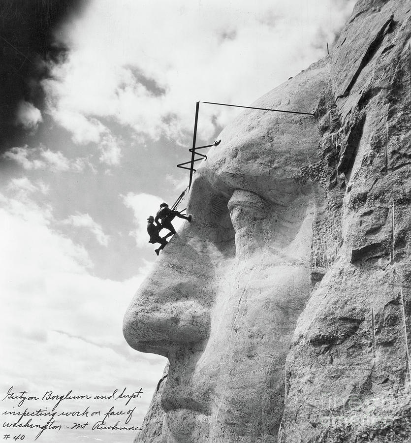 Gutzon Borglum inspecting work on Washington at Mount Rushmore Photograph by American School