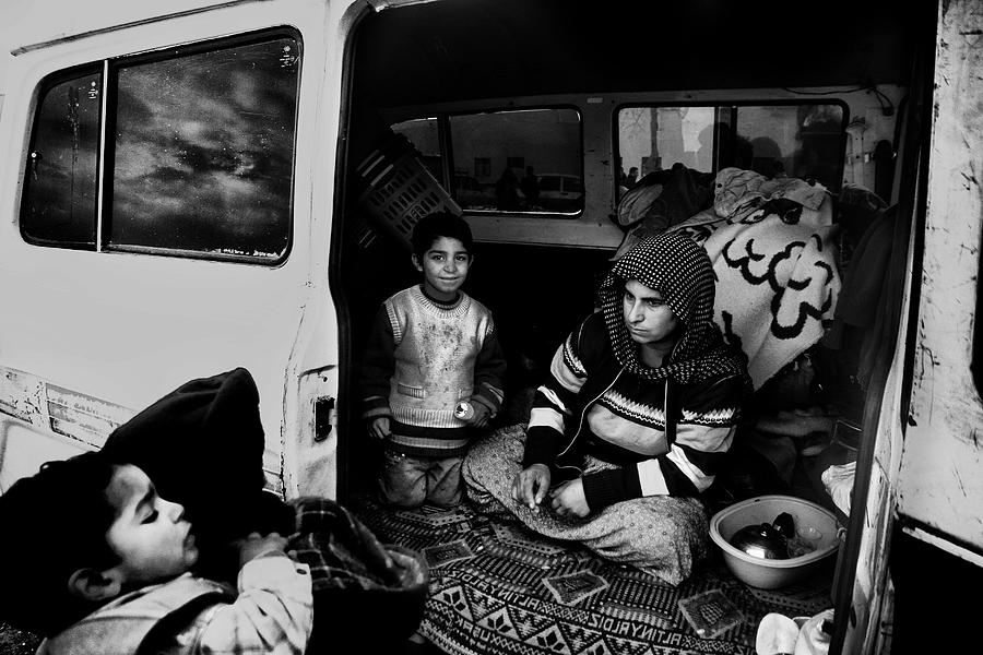 Black And White Photograph - Gypsy Family by Sahin Avci