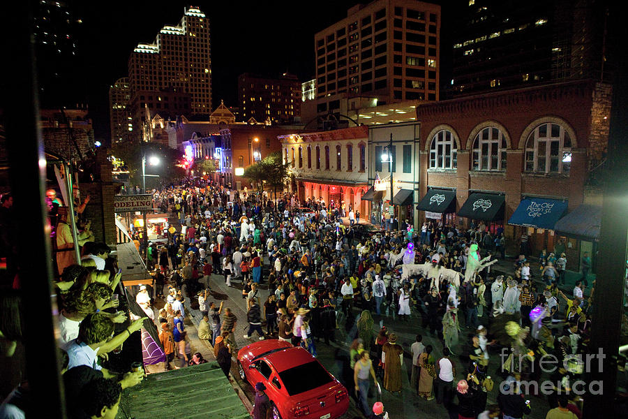 Halloween Draws Tens Of Thousands To Celebrate On 6th Street Photograph