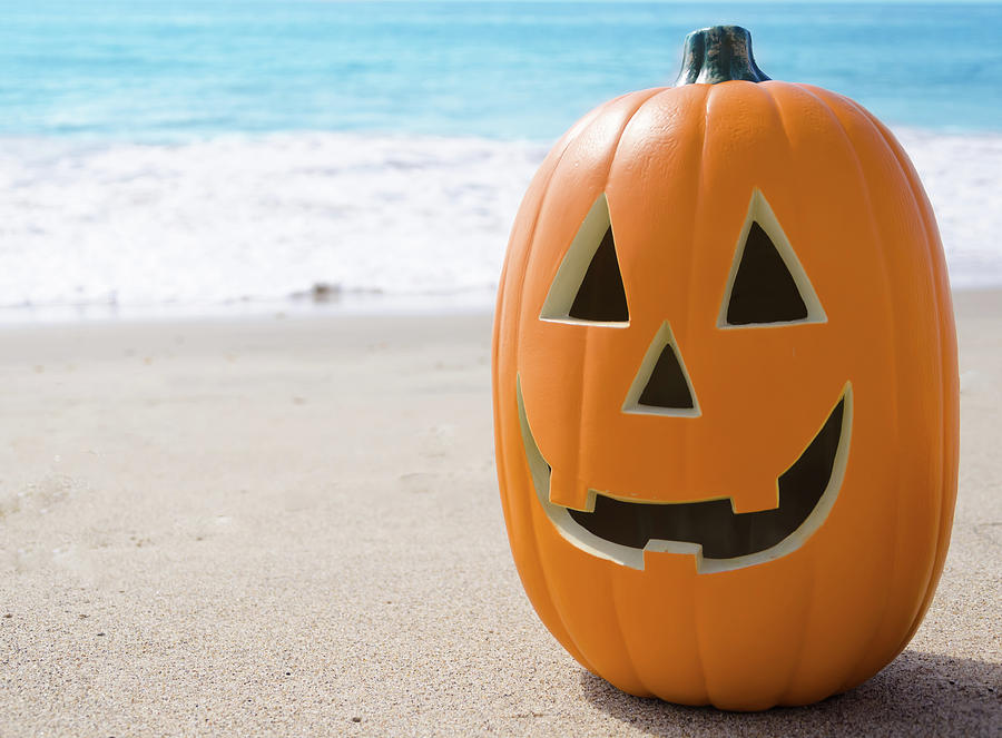 Halloween pumpkin on the beach Photograph by Elena Chukhlebova - Fine ...