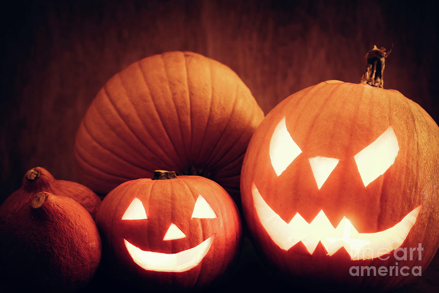 Halloween pumpkins glowing, jack-o-lantern Photograph by Michal Bednarek