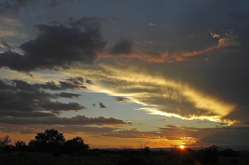 Halo sunset Photograph by Burt Plotkin - Fine Art America