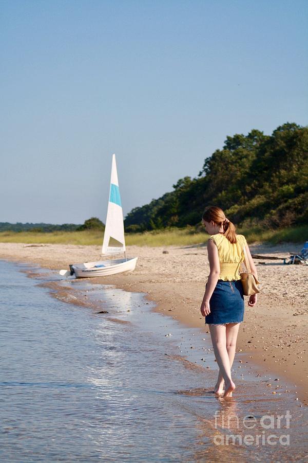 Hampton Girl Walking Beach Near Sailboat Photograph