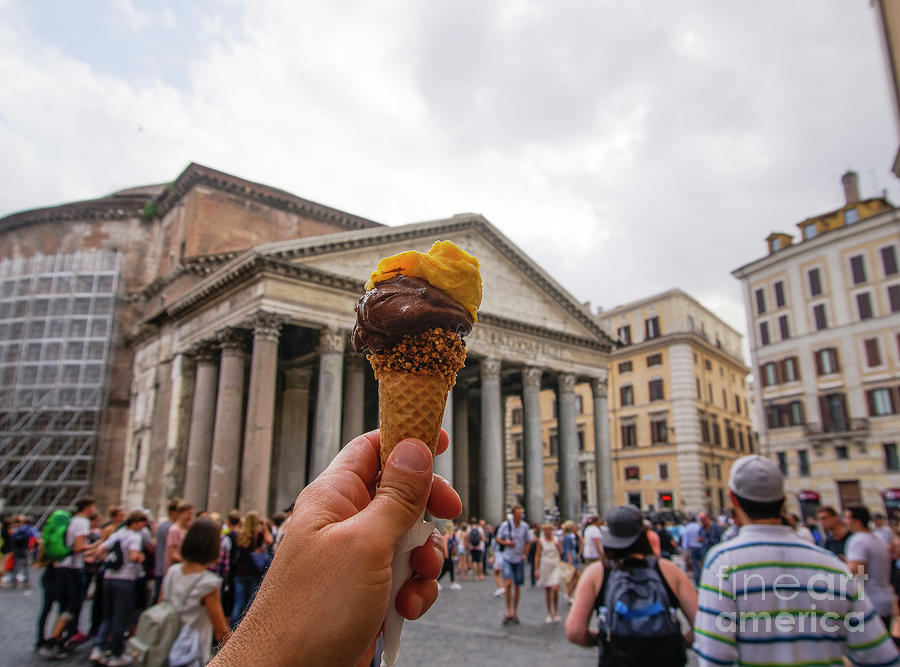 Hand holding ice cream in Rome. Photograph by Theocharis Charitonidis ...