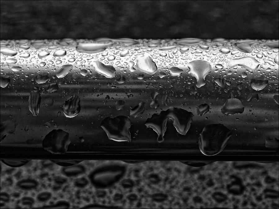Handrail In The Rain Photograph
