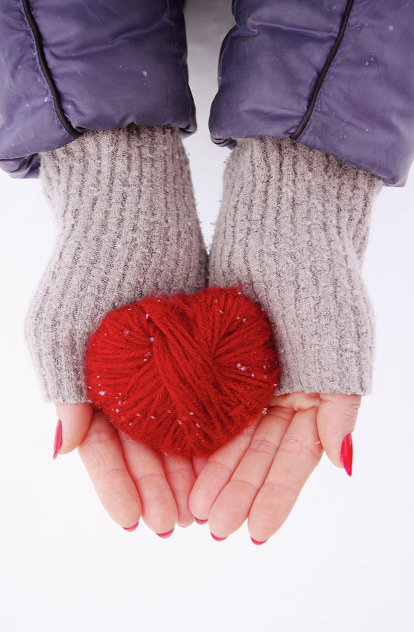 hands holding a red heart by Iuliia Malivanchuk Photograph