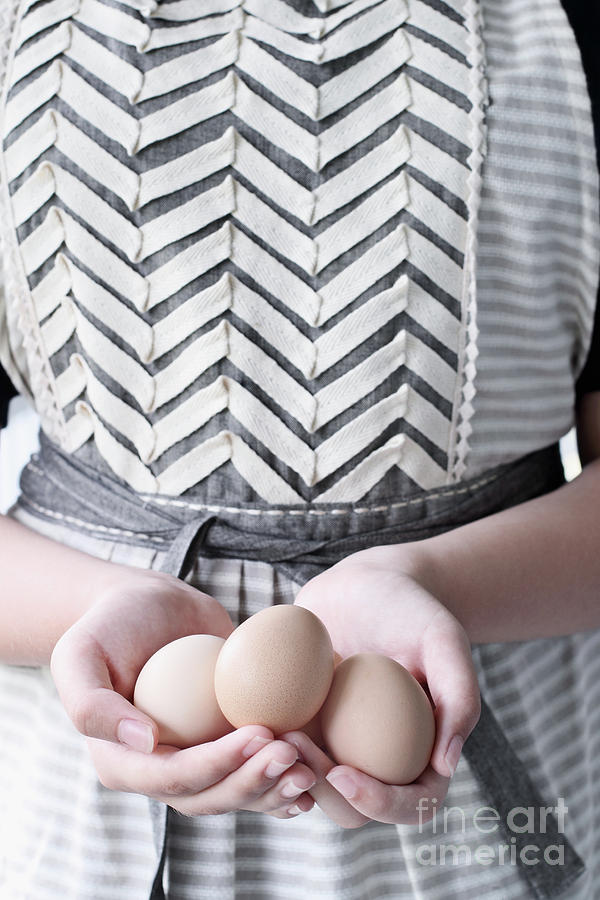 Hands holding three brown eggs Photograph by Stephanie Frey