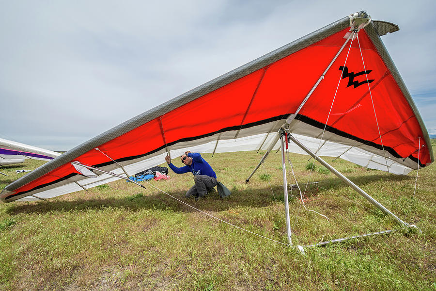 Hang glider pilot preparing for flight Photograph by Elijah er Pixels