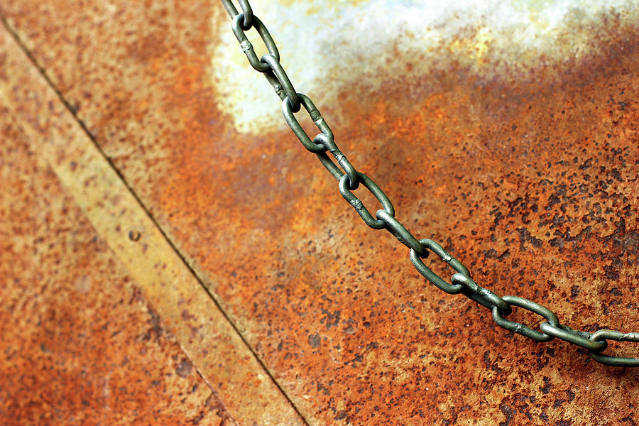 Hanging Iron Chain on a Rusty Textured Background Photograph by Prakash Ghai