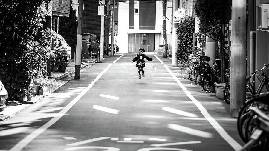 Happiness - Tokyo, Japan - Black and white street photography Photograph by Giuseppe Milo