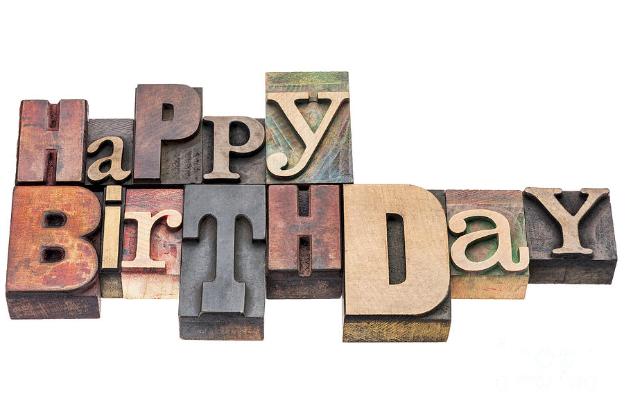 Happy Birthday greeting sign in wood type Photograph by Marek Uliasz