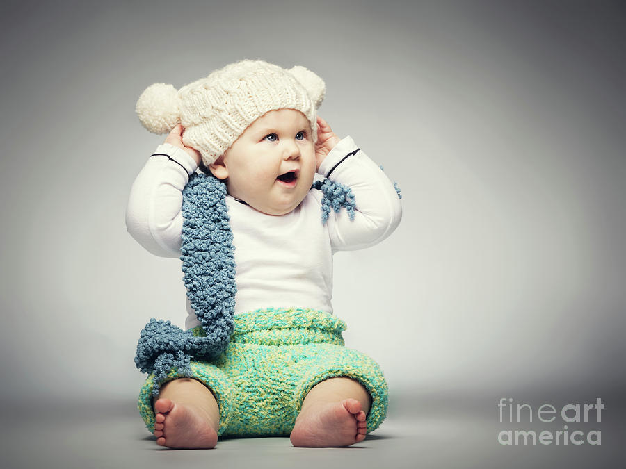 Happy boy in woolen clothes Photograph by Michal Bednarek