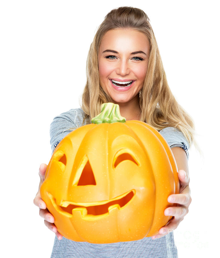 Happy female with Halloween pumpkin Photograph by Anna Om