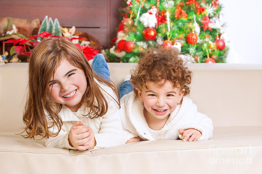 Happy kids in Christmas eve Photograph by Anna Om