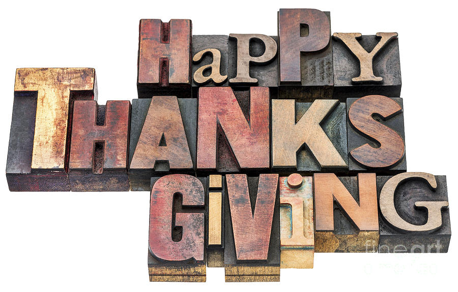 Happy Thanksgiving sign in wood type Photograph by Marek Uliasz