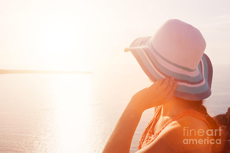 Happy woman in sun hat enjoying the sea view Photograph by Michal Bednarek