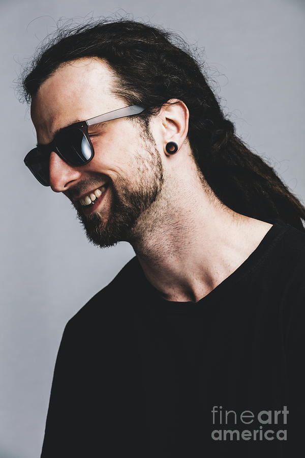 Cool Photograph - Happy young man with dreadlocks and dark sunglasses. by Michal Bednarek
