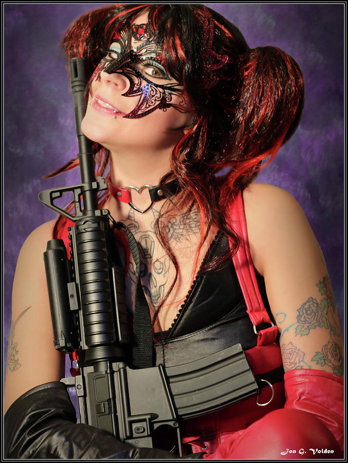 Harlequin With Gun Photograph by Jon Volden