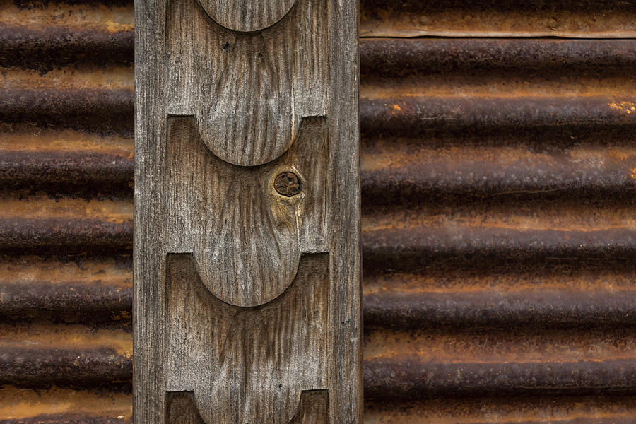 Harmonious Interplay - Weathered Wood and Rusty Metal Photograph by Georgia Mizuleva