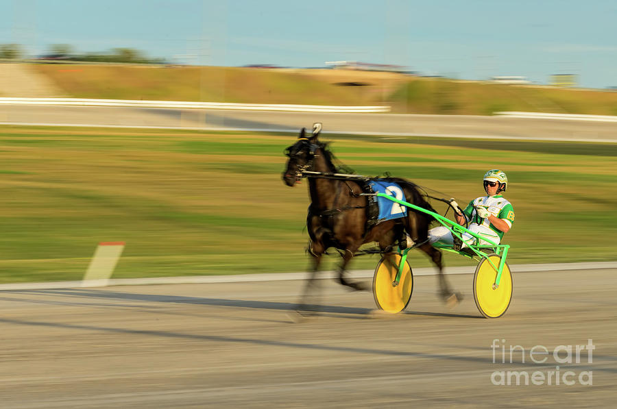 Harness Racing - slow shutter panned image Photograph by Les Palenik