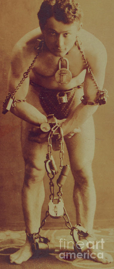 Up Movie Photograph - Harry Houdini in chains by American School