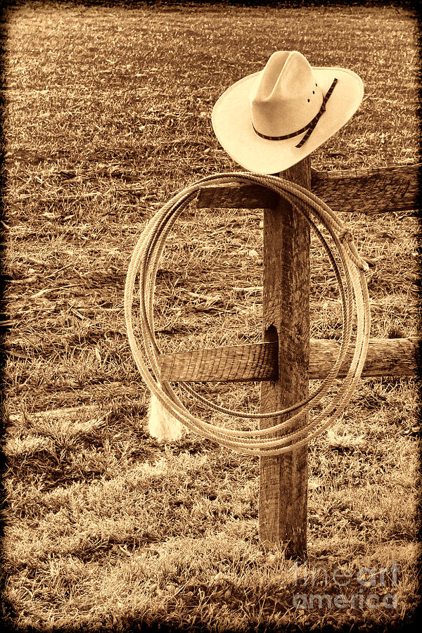 Hat and Lariat on a Post Photograph by American West Legend By Olivier Le Queinec
