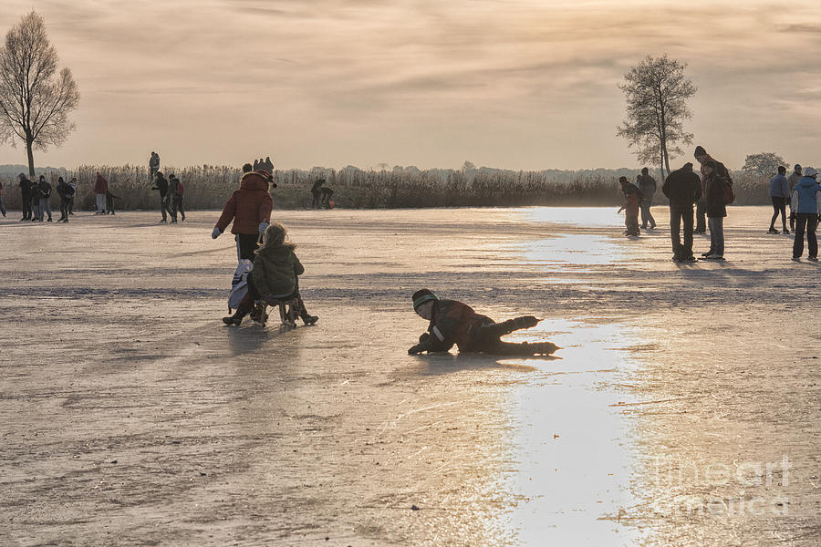 Winter Photograph - Having fun on natural ice by Patricia Hofmeester
