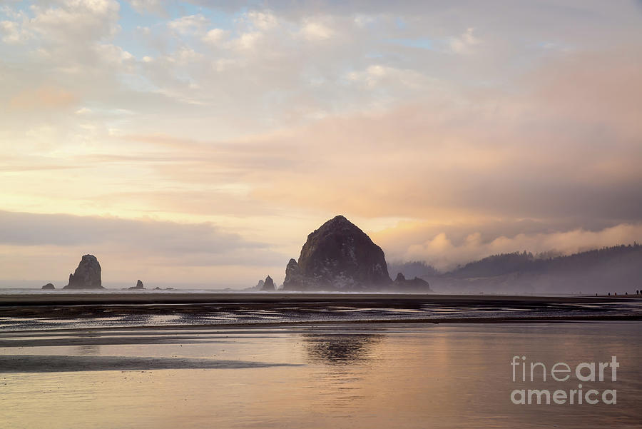 Haystack rock after the rain Photograph by Paul Quinn