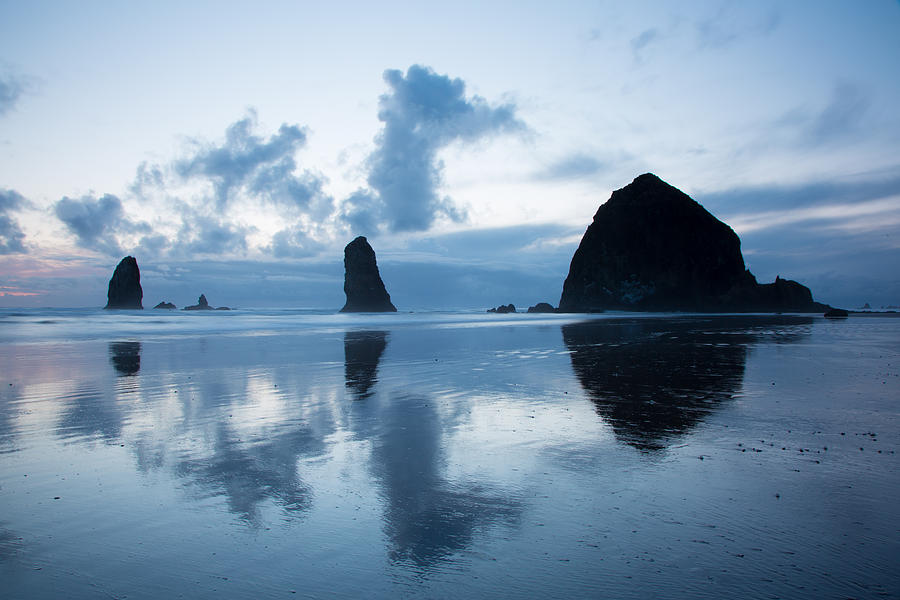 Haystack Rock and Refection Photograph by Jack Nevitt