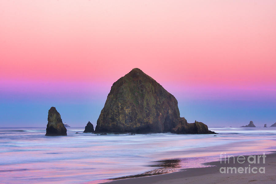 Haystack Rock at dawn Photograph by Bruce Block