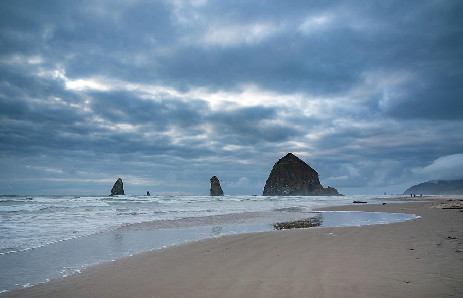 Haystack Rock, the Needles, and Cannon Beach Photograph by Anthony Doudt