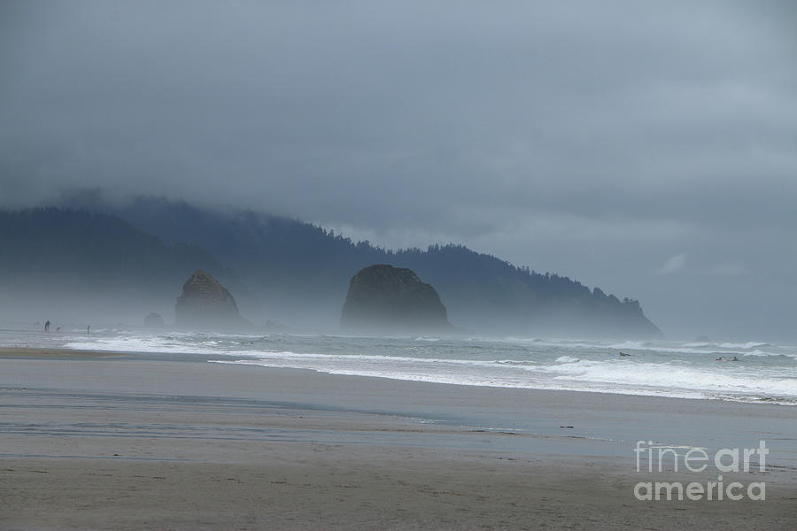 Haystack Rocks In Fog On Cannon Beach Photograph by Christiane Schulze Art And Photography