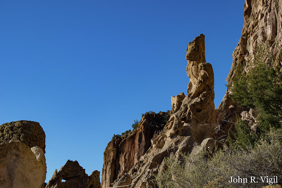 Landscape Photograph - He Who Looks Over The Canyon by John Vigil