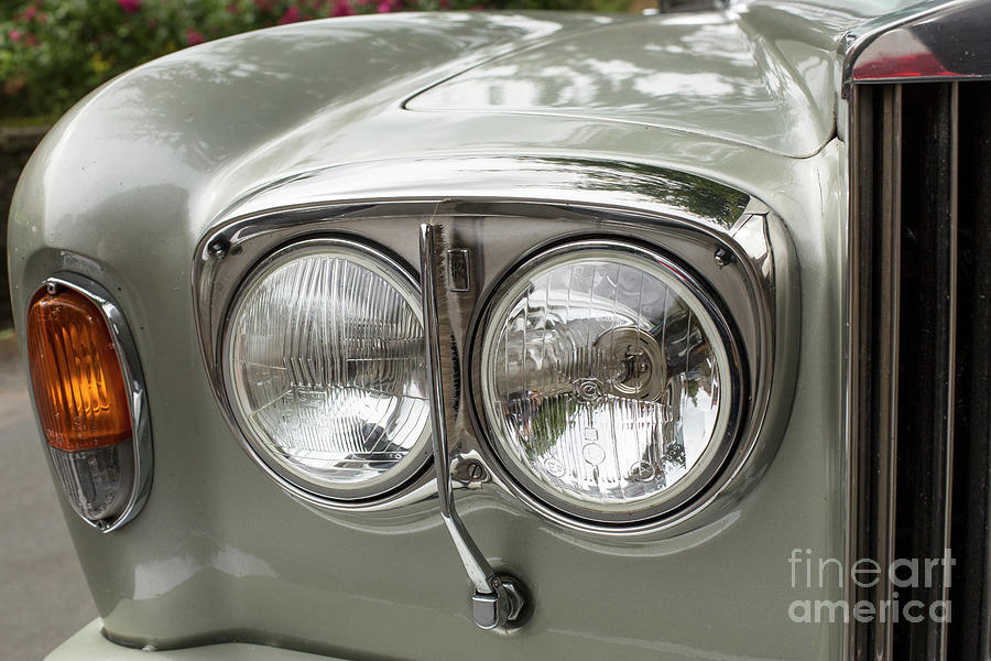 Head lights of a Rolls Royce Photograph by Patricia Hofmeester