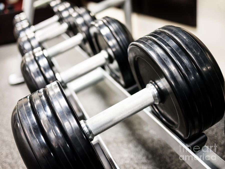 Club Photograph - Healthclub Free Weights on a Rack by Paul Velgos