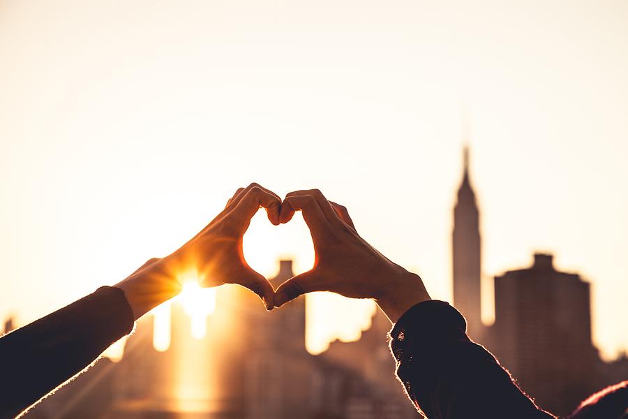 Heart shape with female hands on the sunlight. Photograph by Leonardo ...