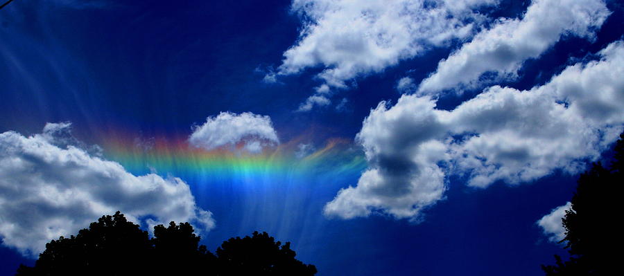 Heavens rainbow Photograph by Linda Sannuti