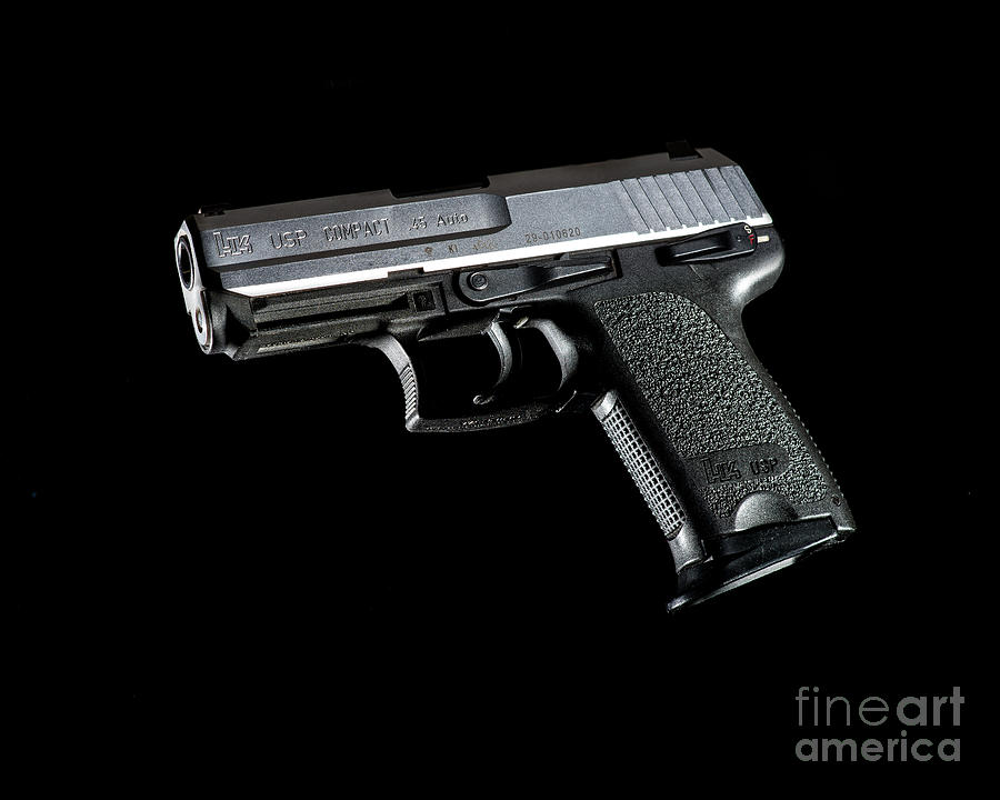 Heckler and Koch .45 on a black background Photograph by Jamie Harris -  Fine Art America