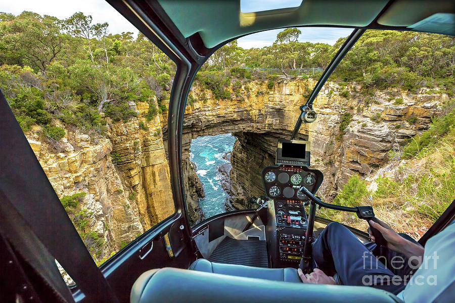 Helicopter on Tasman Arch Photograph by Benny Marty