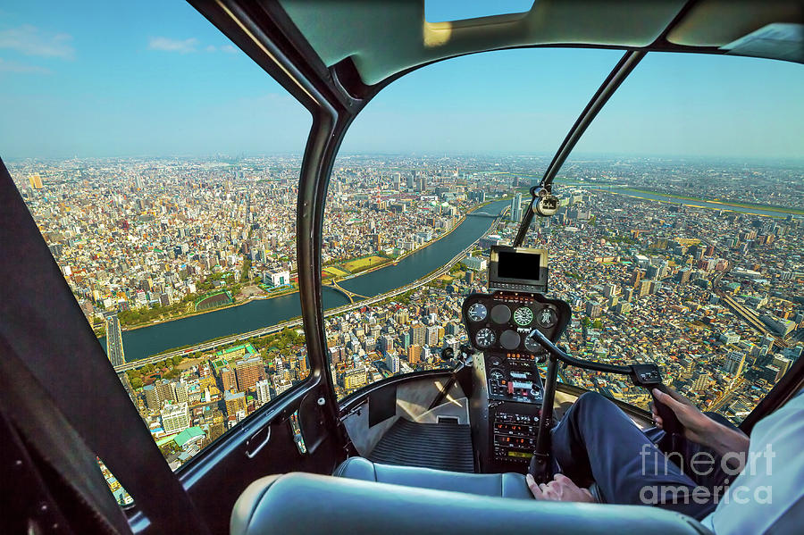 Helicopter on Tokyo skyline Photograph by Benny Marty