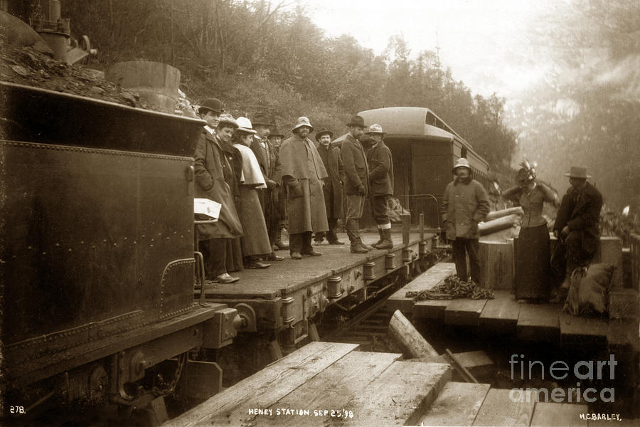 1898 Photograph - Heney station Sept. 25 1898 men and women on a Flat car White Pass and Yukon Route Railroad Alaska by Monterey County Historical Society