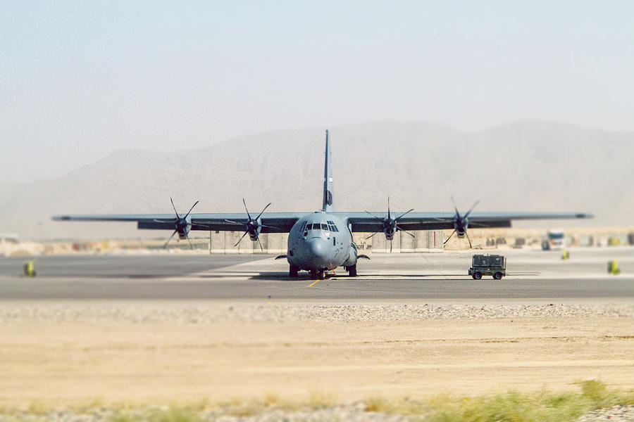 Hercules C-130 on Runway Photograph by SR Green