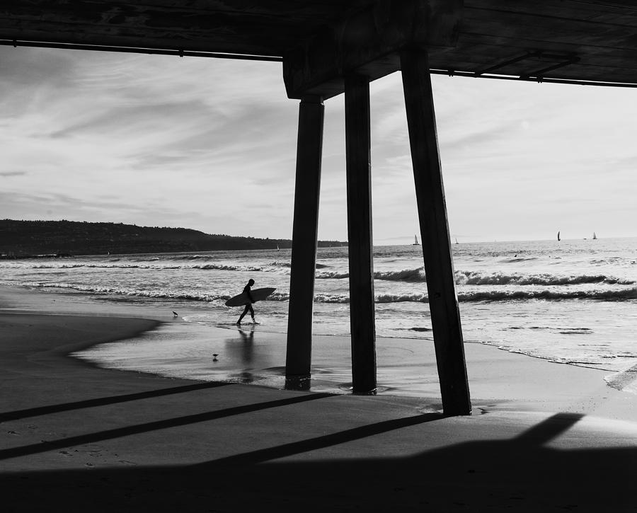 Hermosa Surfer Under Pier Photograph by Michael Hope