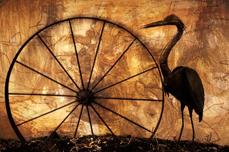 Heron and Wheel Photograph by Jim Vance